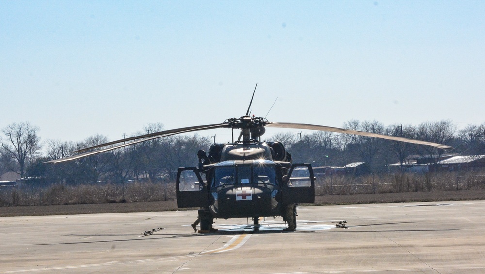 UH-60 aircraft are prepped to transport supplies to Texans