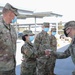 U.S. Army Col. Robert Wooldridge awards coins to Cal Guardsmen at Cal State LA vaccine site
