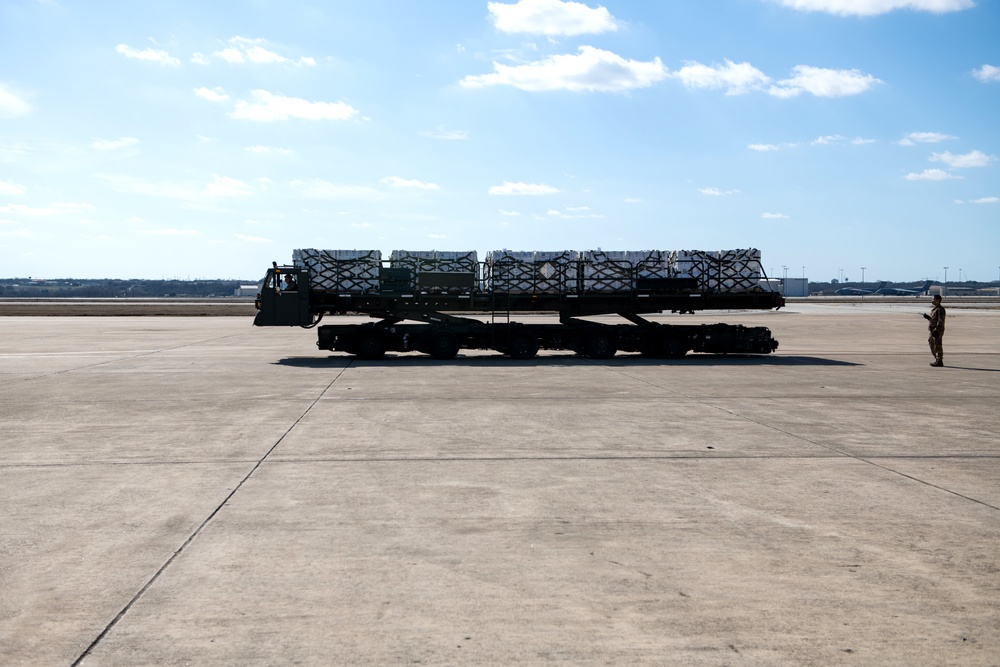 502LRS unloads 80,000 bottles of water after winter storm Uri