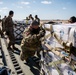 502LRS unloads 80,000 bottles of water after winter storm Uri