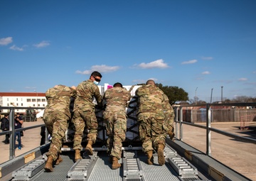 502LRS unloads 80,000 bottles of water after winter storm Uri