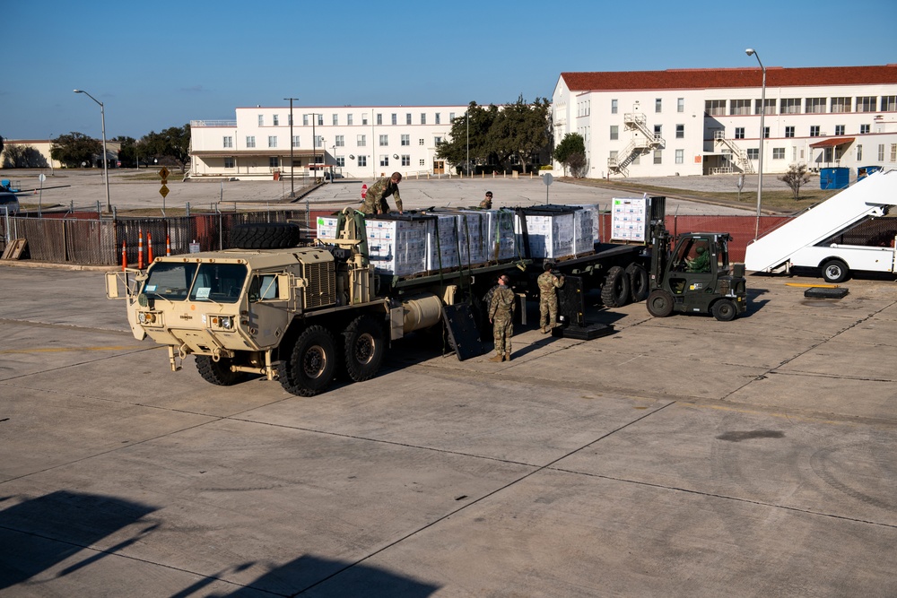 502LRS unloads 80,000 bottles of water after winter storm Uri