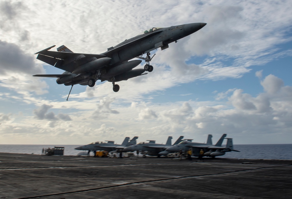 Jet Conducts Flyby Over USS Nimitz