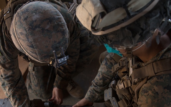 Bravo Company, BLT 1/4 Marines provide security and conduct base defense drills at BMA