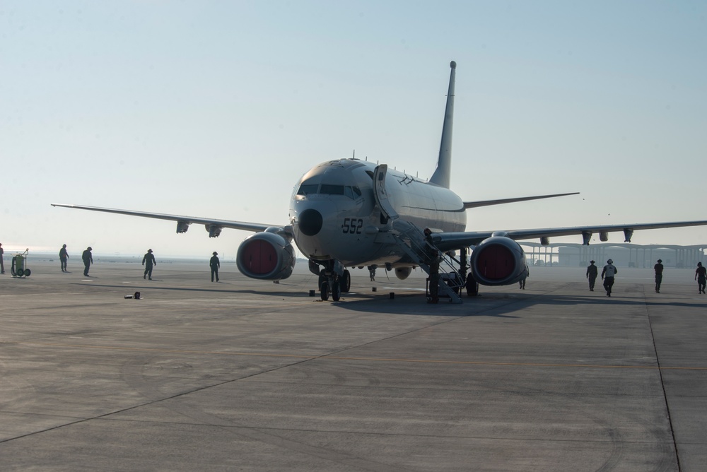 Sailors Perform FOD Walk Down
