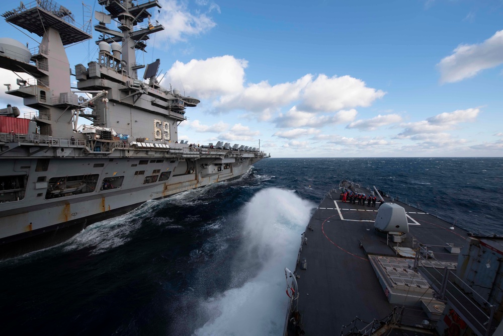 Mitscher Conducts fueling-at-sea with Eisenhower