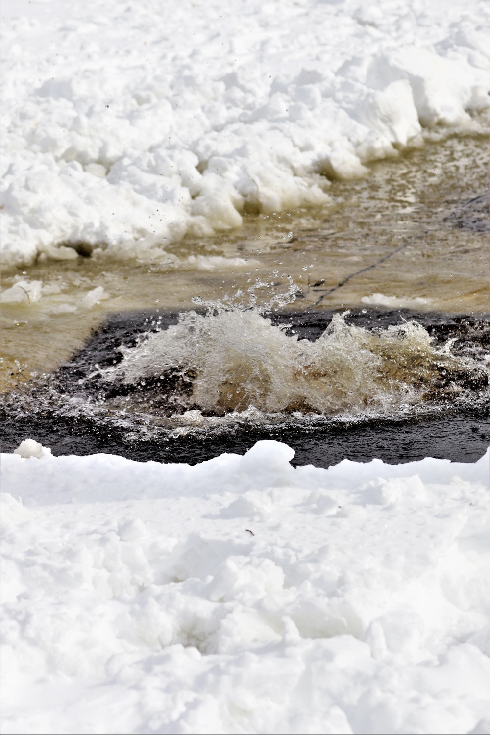 Fort McCoy CWOC class 21-03 students jump in for cold-water immersion training
