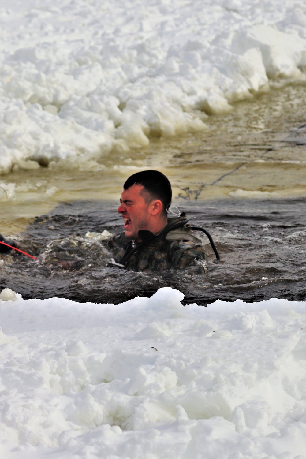 Fort McCoy CWOC class 21-03 students jump in for cold-water immersion training