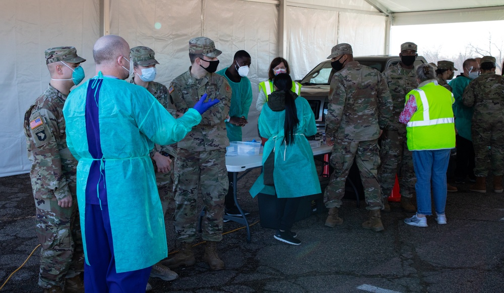 U.S. Army Soldiers shadow medical workers at Community Vaccination Center