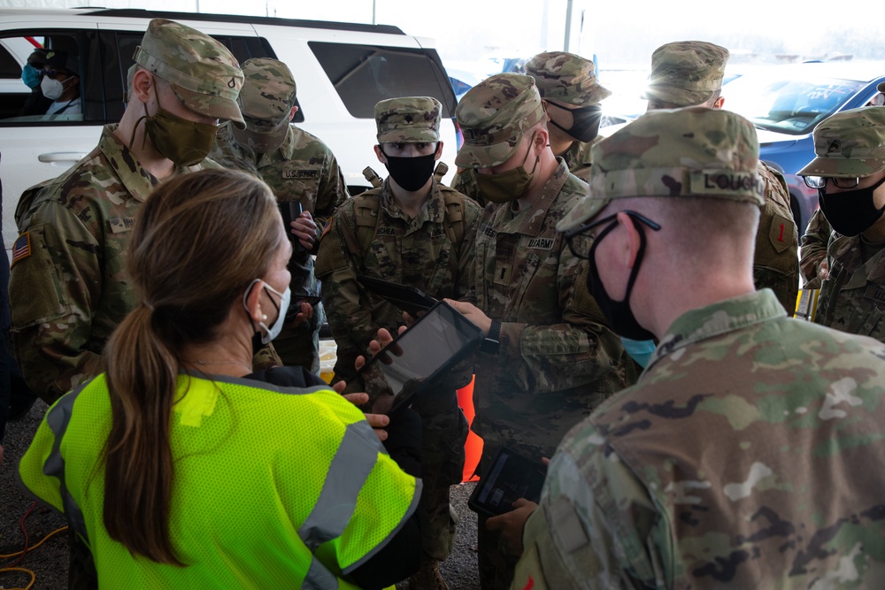 U.S. Army Soldiers shadow medical workers at Community Vaccination Center