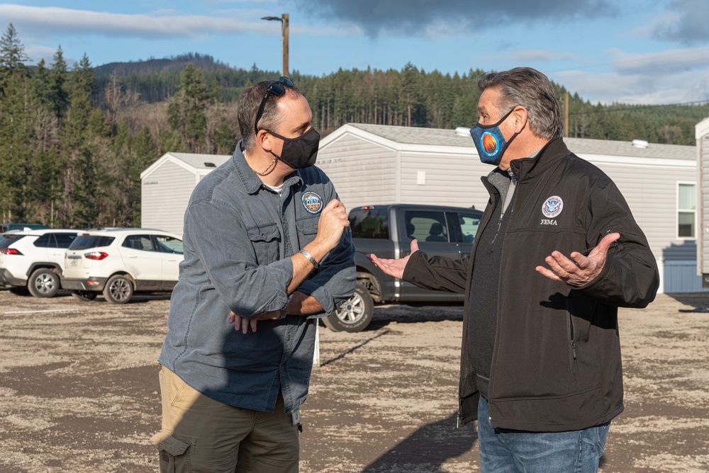 Officials talk at Mill City FEMA Housing installation project