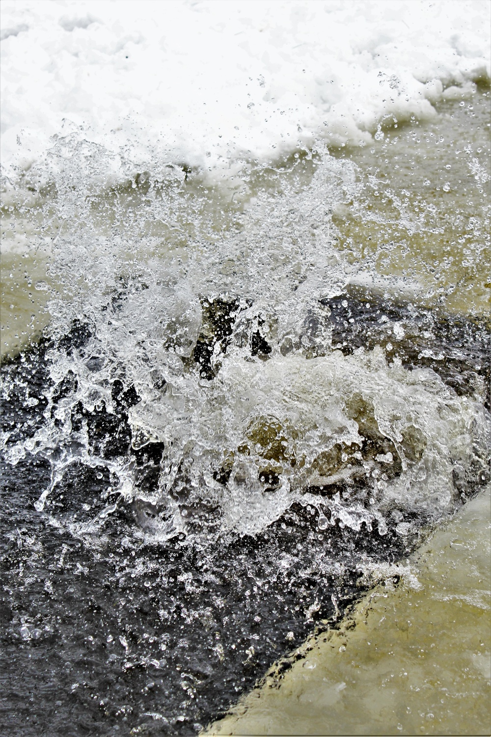 Fort McCoy CWOC class 21-03 students jump in for cold-water immersion training