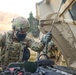 Inspecting a Humvee