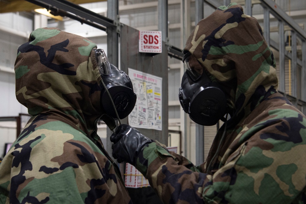 305th MXS simulates chemical warfare operations
