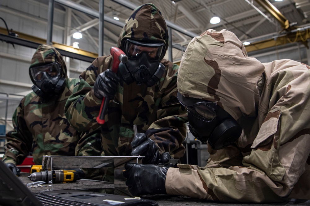 305th MXS simulates chemical warfare operations