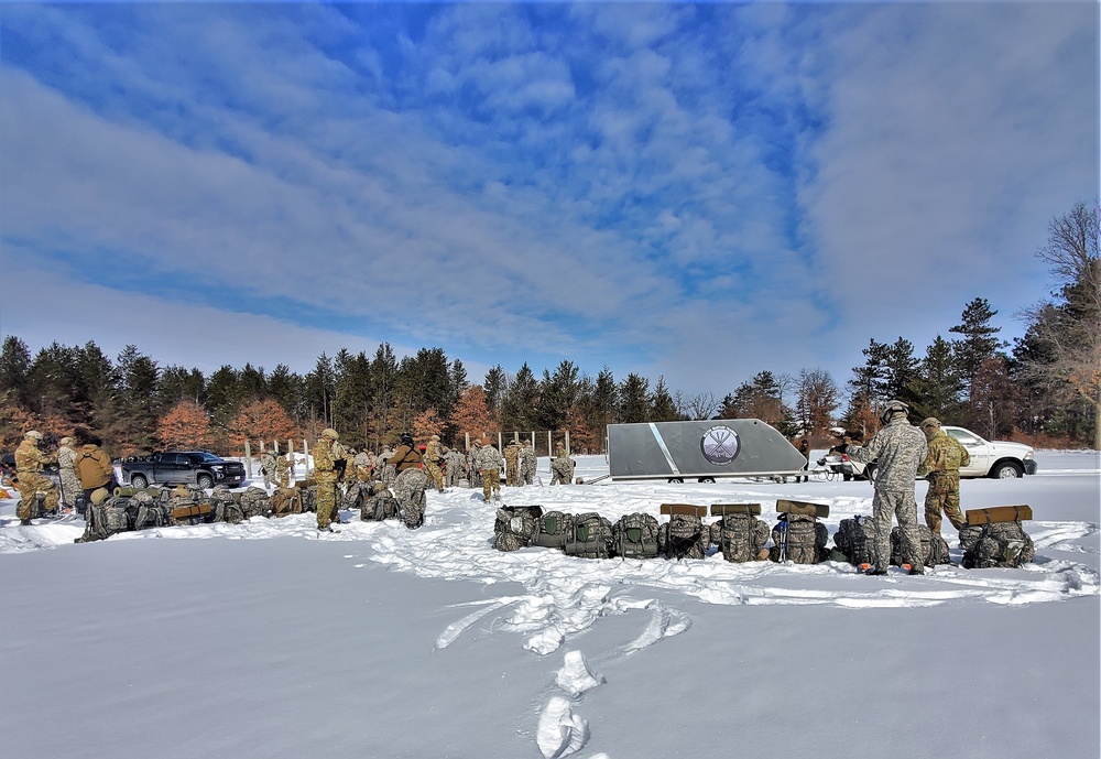 Fort McCoy Cold-Weather Operations Course Class 21-04 students conduct field training in snowshoes