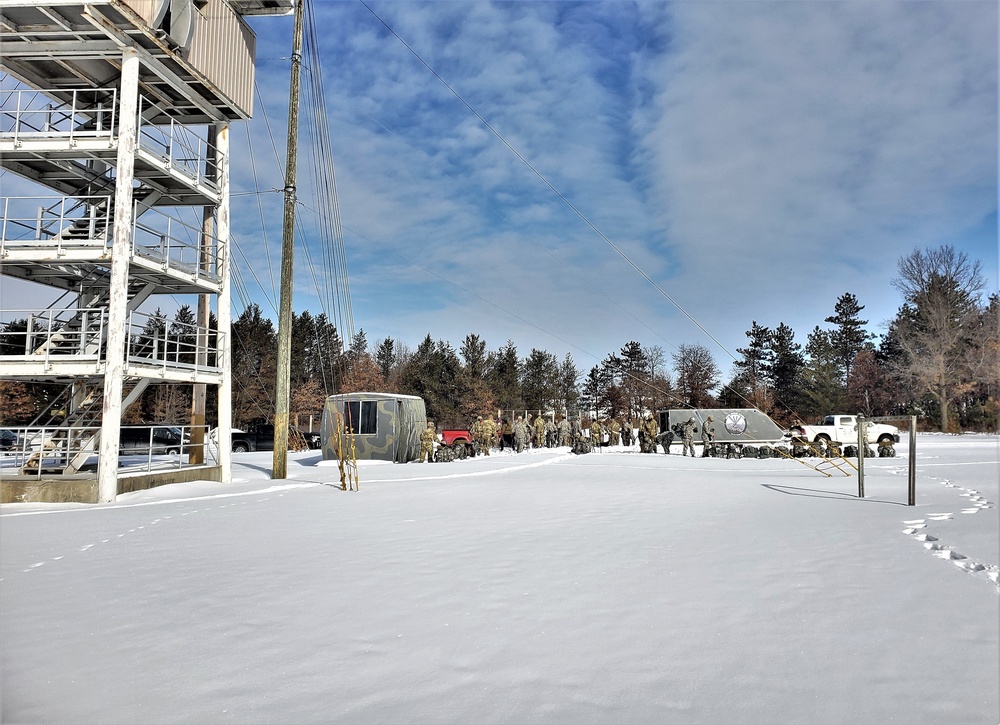 Fort McCoy Cold-Weather Operations Course Class 21-04 students conduct field training in snowshoes