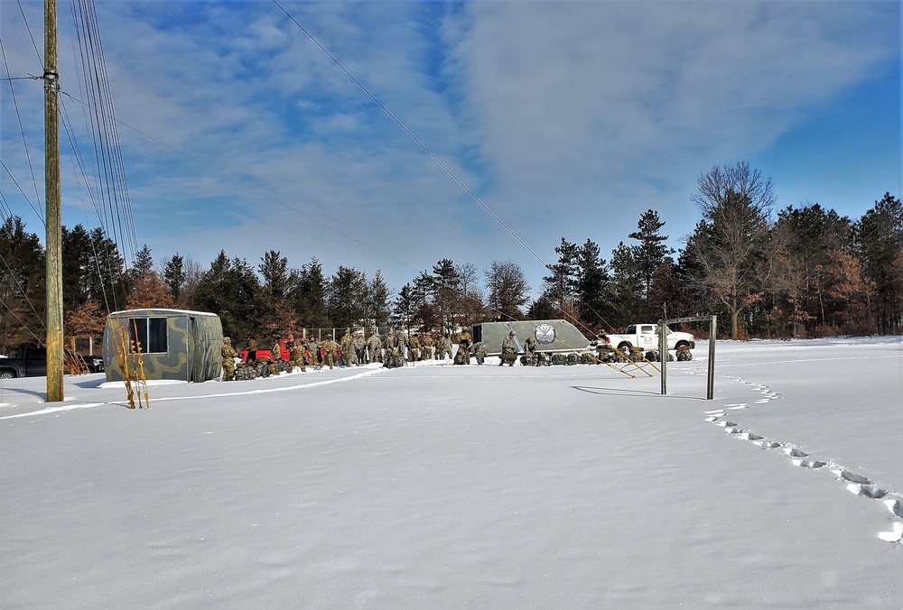 Fort McCoy Cold-Weather Operations Course Class 21-04 students conduct field training in snowshoes