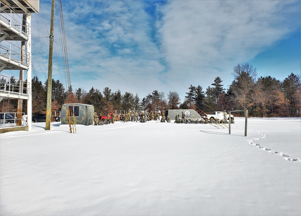 Fort McCoy Cold-Weather Operations Course Class 21-04 students conduct field training in snowshoes