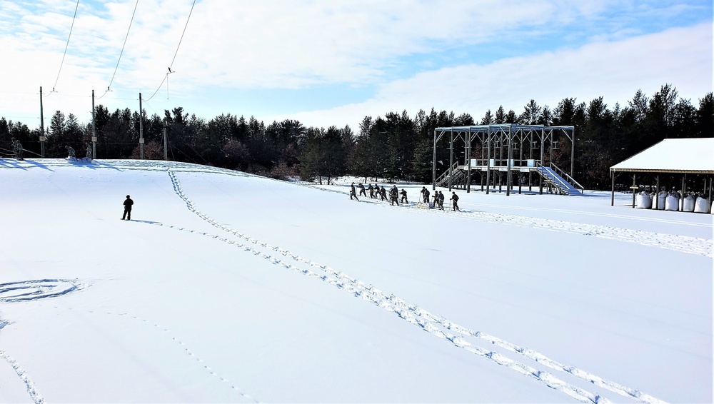 Fort McCoy Cold-Weather Operations Course Class 21-04 students conduct field training in snowshoes