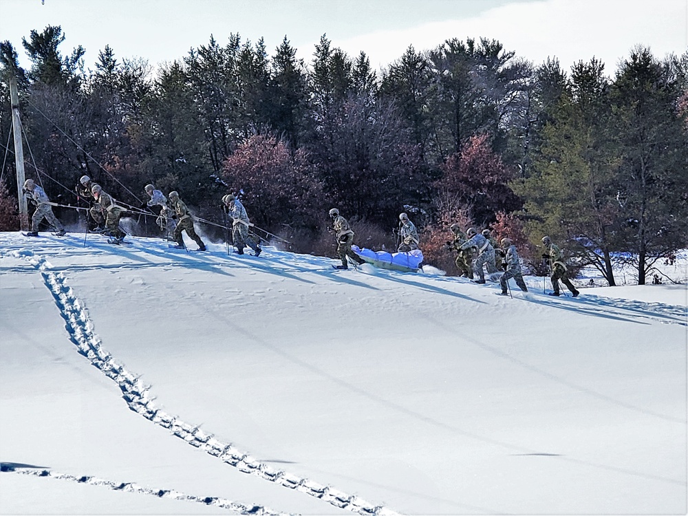 Fort McCoy Cold-Weather Operations Course Class 21-04 students conduct field training in snowshoes