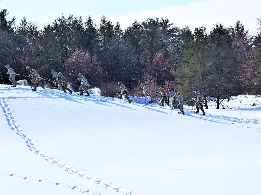 Fort McCoy Cold-Weather Operations Course Class 21-04 students conduct field training in snowshoes