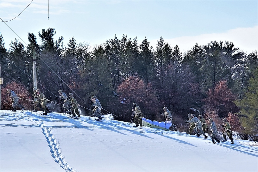 Fort McCoy Cold-Weather Operations Course Class 21-04 students conduct field training in snowshoes
