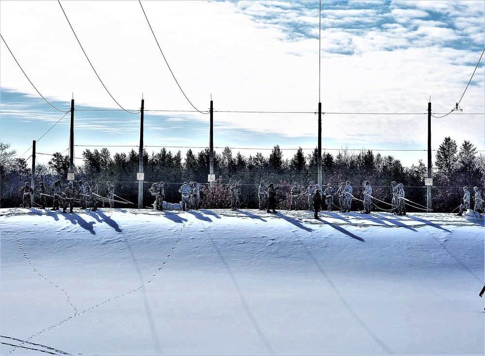 Fort McCoy Cold-Weather Operations Course Class 21-04 students conduct field training in snowshoes