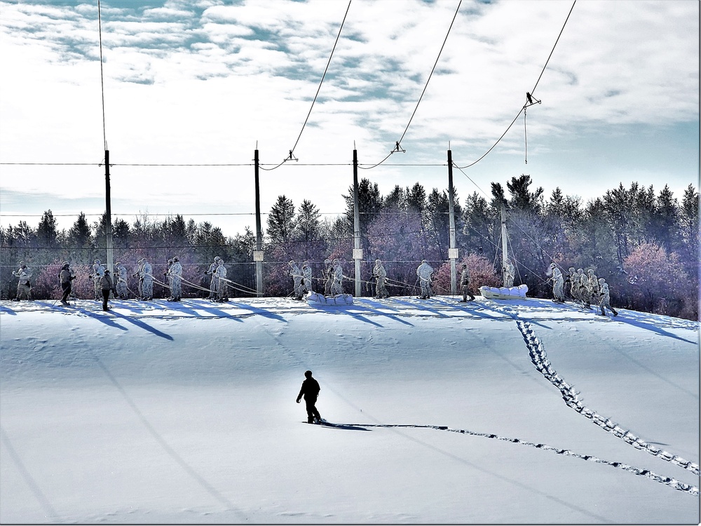 Fort McCoy Cold-Weather Operations Course Class 21-04 students conduct field training in snowshoes