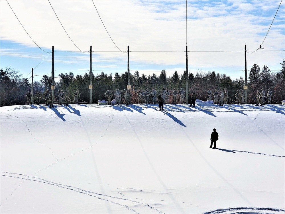 Fort McCoy Cold-Weather Operations Course Class 21-04 students conduct field training in snowshoes