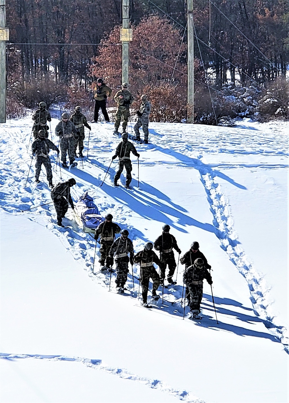 Fort McCoy Cold-Weather Operations Course Class 21-04 students conduct field training in snowshoes