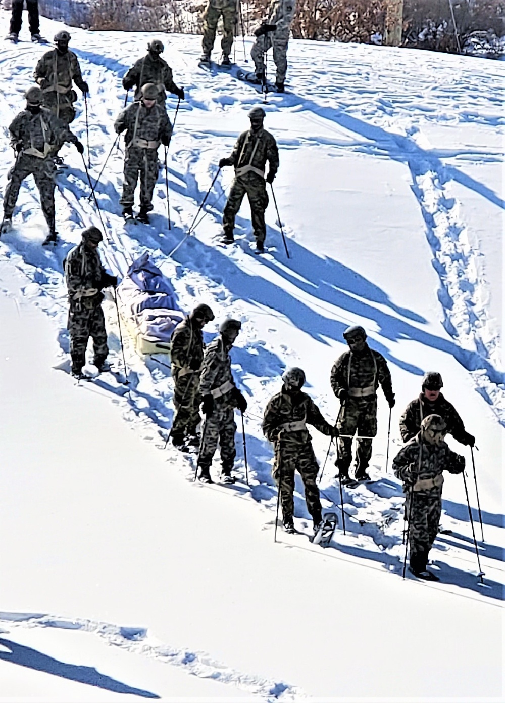 Fort McCoy Cold-Weather Operations Course Class 21-04 students conduct field training in snowshoes