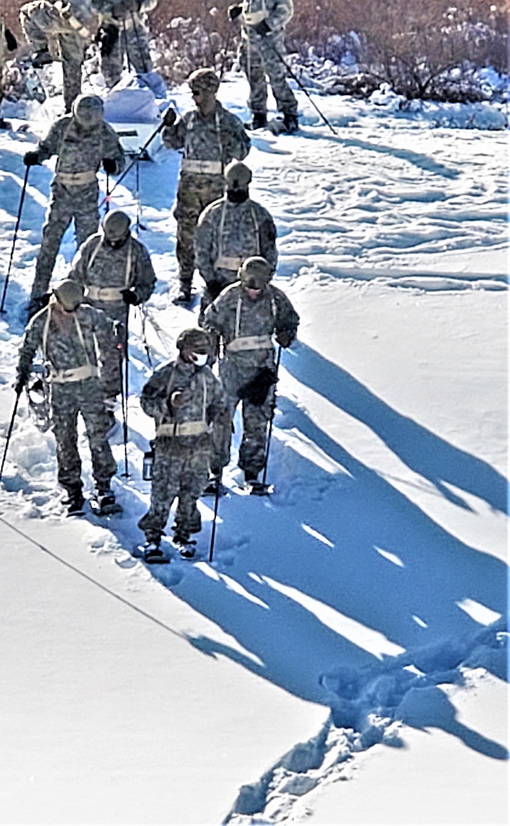 Fort McCoy Cold-Weather Operations Course Class 21-04 students conduct field training in snowshoes