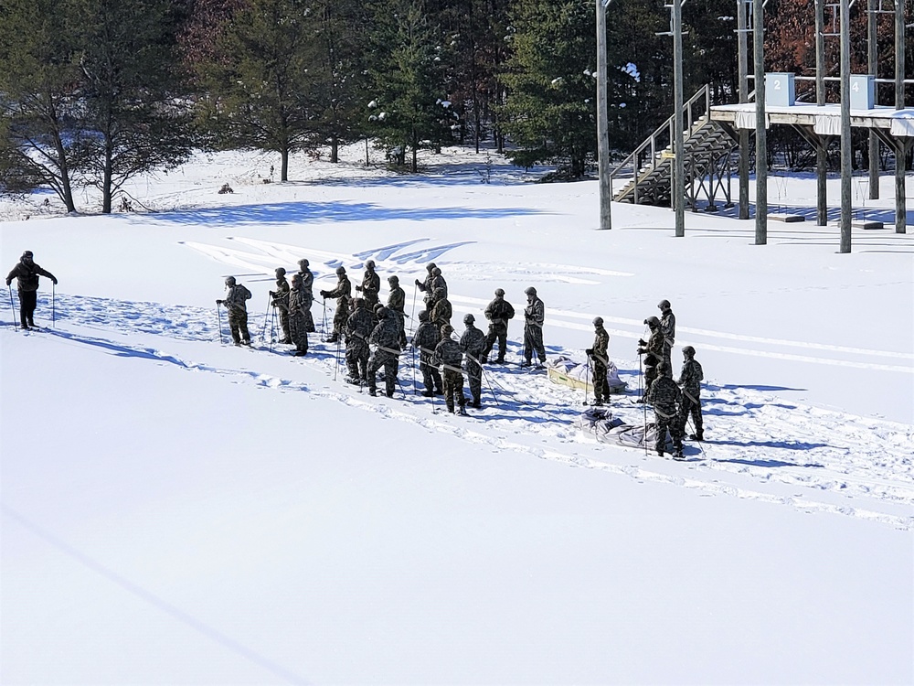 Fort McCoy Cold-Weather Operations Course Class 21-04 students conduct field training in snowshoes
