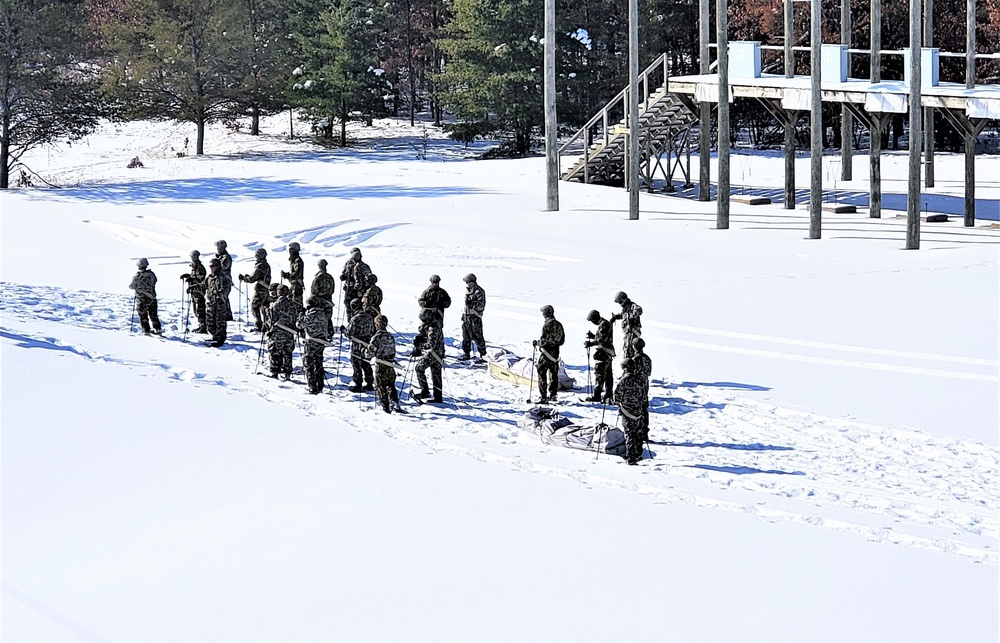 Fort McCoy Cold-Weather Operations Course Class 21-04 students conduct field training in snowshoes