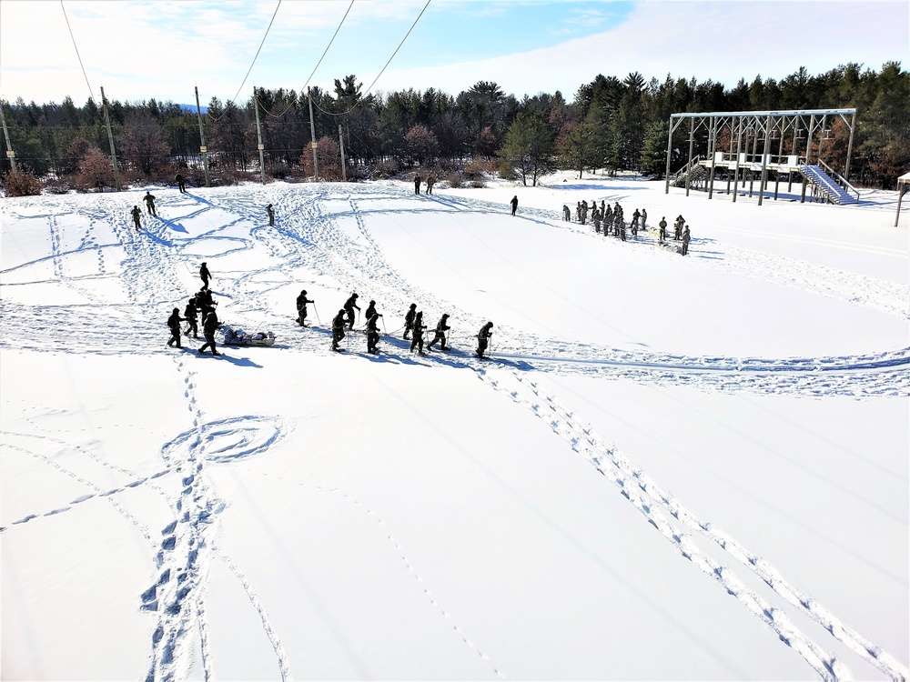 Fort McCoy Cold-Weather Operations Course Class 21-04 students conduct field training in snowshoes
