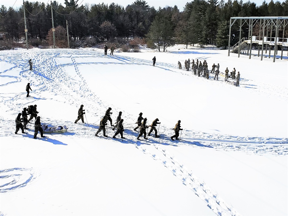 Fort McCoy Cold-Weather Operations Course Class 21-04 students conduct field training in snowshoes