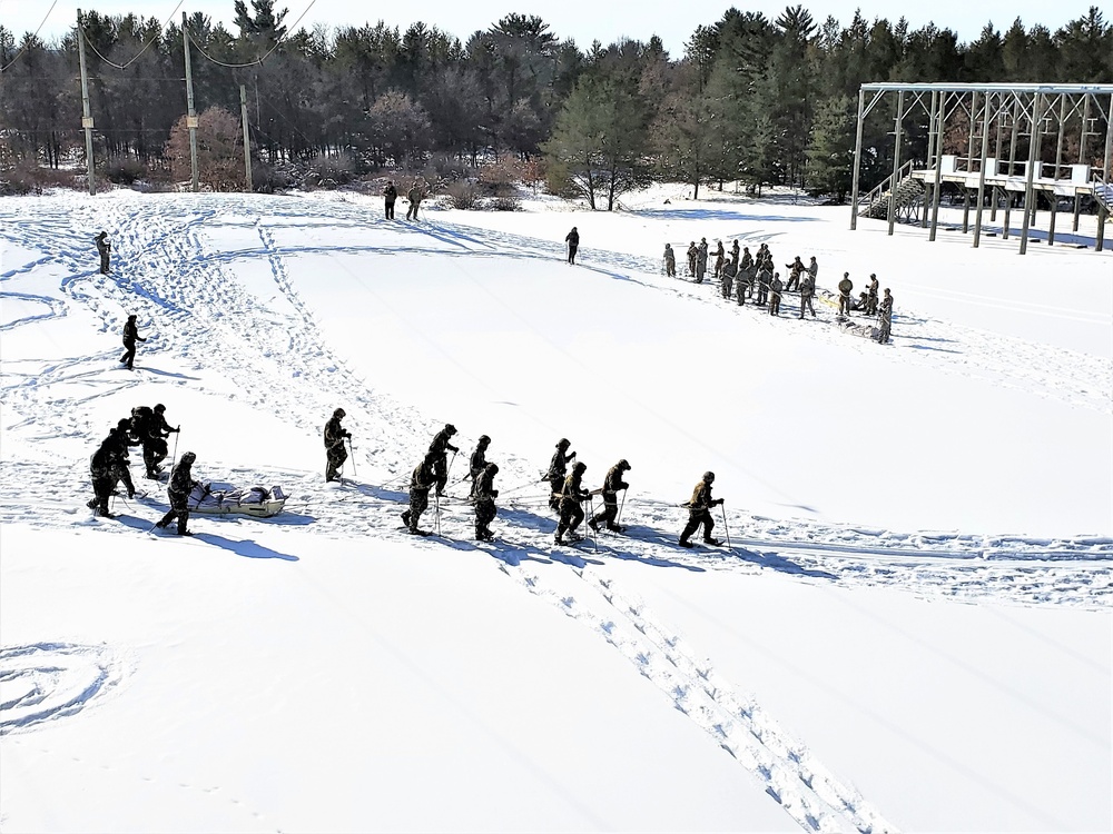 Fort McCoy Cold-Weather Operations Course Class 21-04 students conduct field training in snowshoes