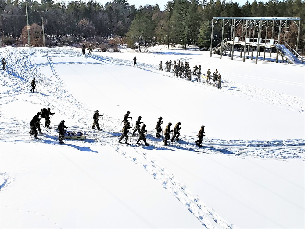 Fort McCoy Cold-Weather Operations Course Class 21-04 students conduct field training in snowshoes