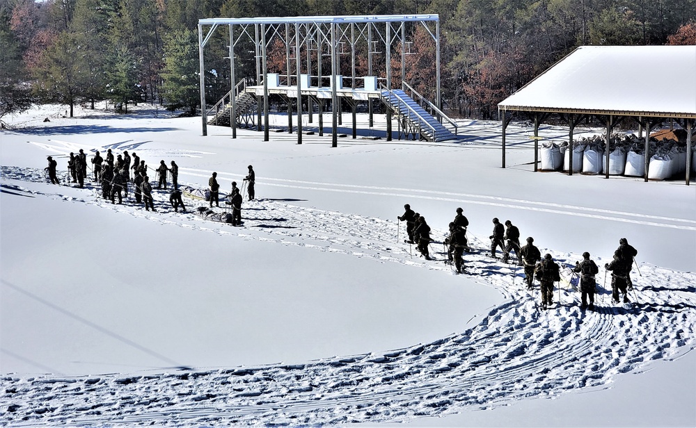 Fort McCoy Cold-Weather Operations Course Class 21-04 students conduct field training in snowshoes