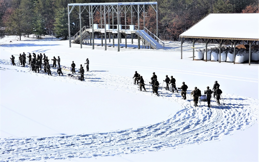 Fort McCoy Cold-Weather Operations Course Class 21-04 students conduct field training in snowshoes
