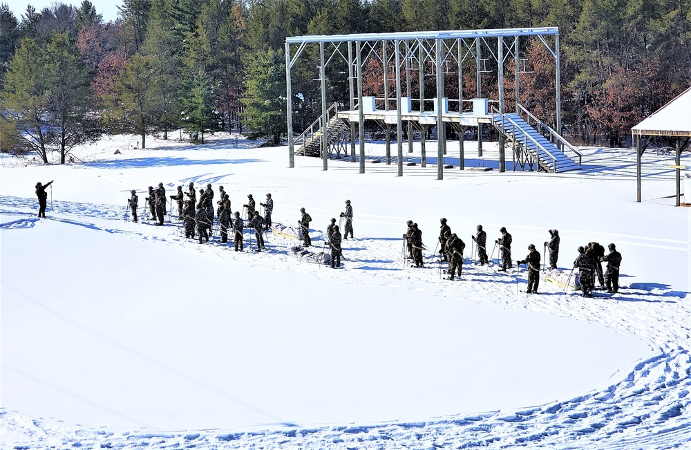 Fort McCoy Cold-Weather Operations Course Class 21-04 students conduct field training in snowshoes