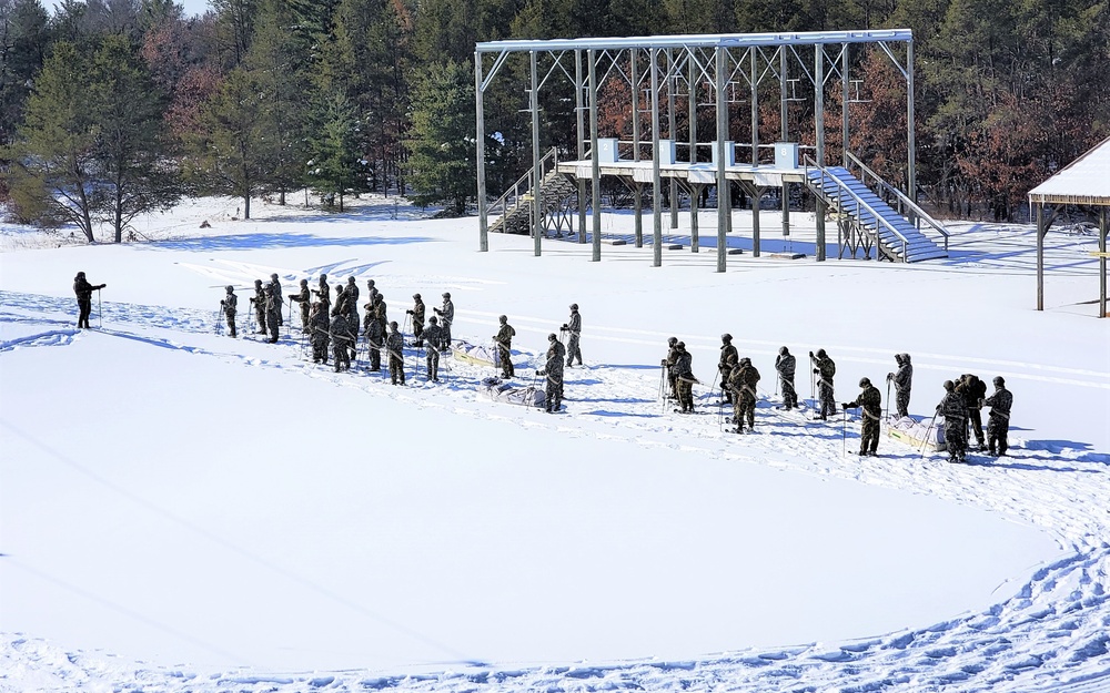 Fort McCoy Cold-Weather Operations Course Class 21-04 students conduct field training in snowshoes