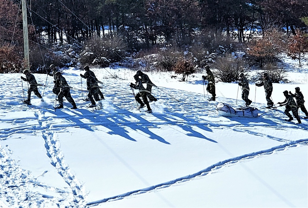 Fort McCoy Cold-Weather Operations Course Class 21-04 students conduct field training in snowshoes