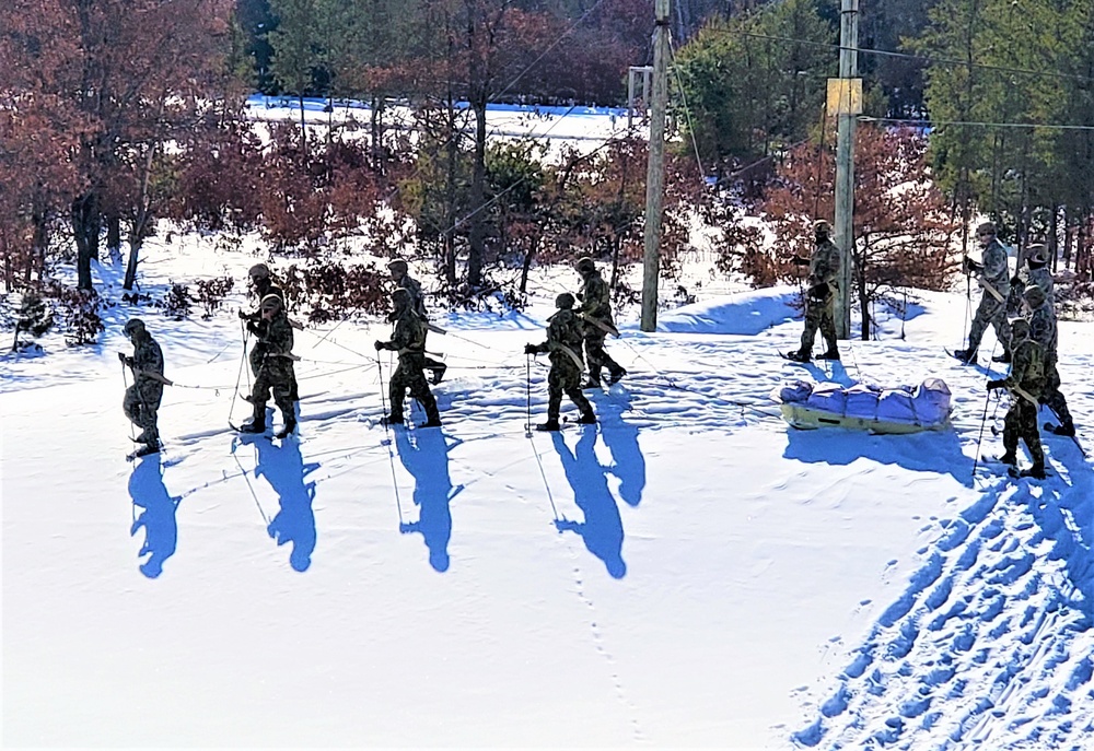 Fort McCoy Cold-Weather Operations Course Class 21-04 students conduct field training in snowshoes