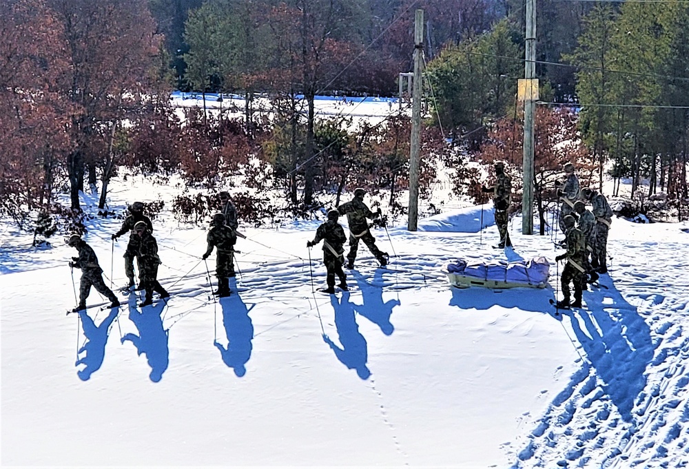 Fort McCoy Cold-Weather Operations Course Class 21-04 students conduct field training in snowshoes