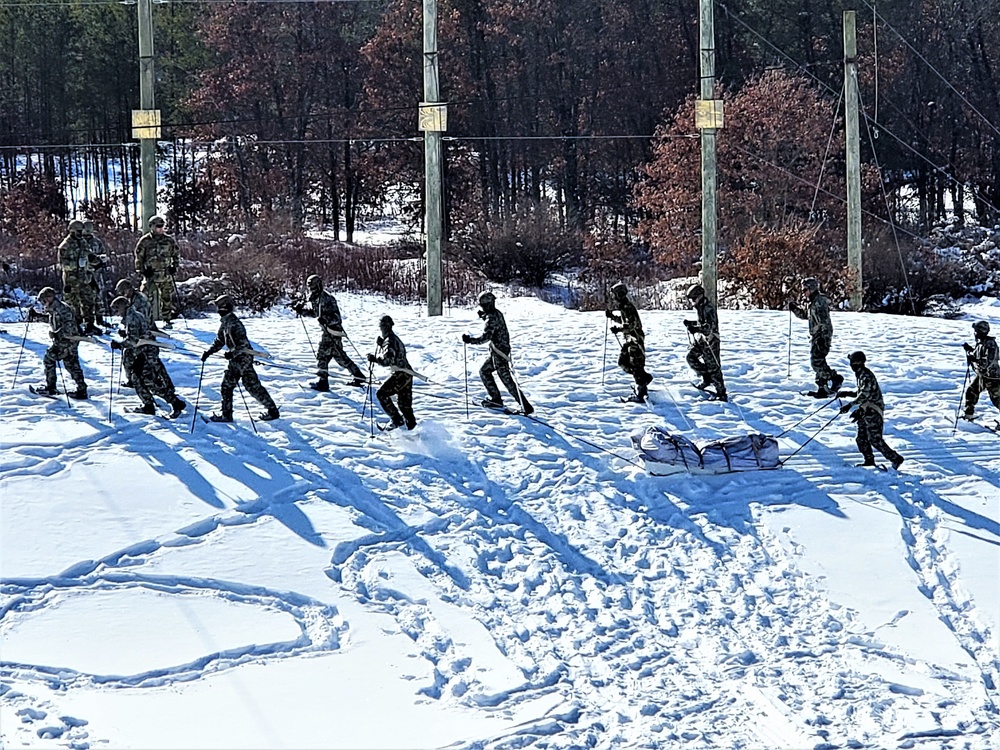 Fort McCoy Cold-Weather Operations Course Class 21-04 students conduct field training in snowshoes