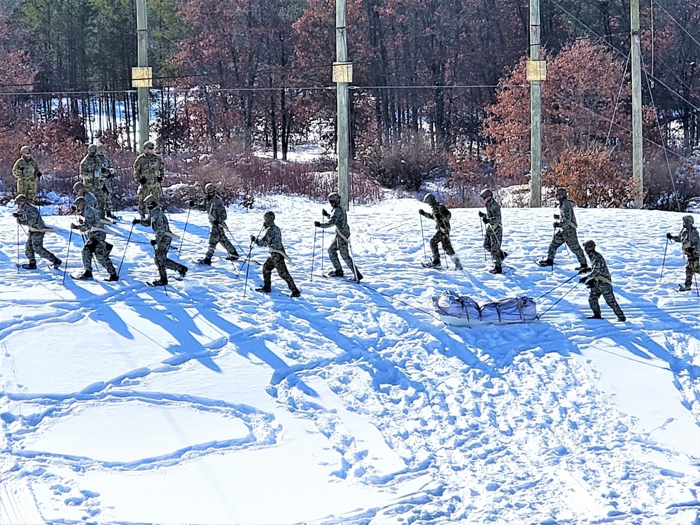Fort McCoy Cold-Weather Operations Course Class 21-04 students conduct field training in snowshoes