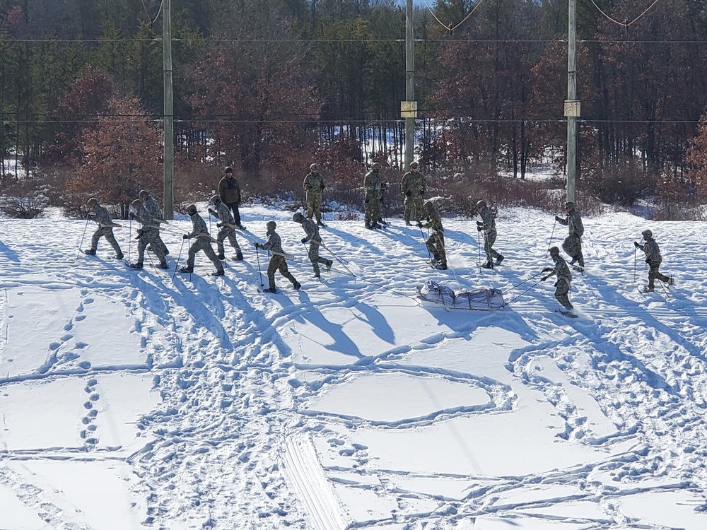 Fort McCoy Cold-Weather Operations Course Class 21-04 students conduct field training in snowshoes