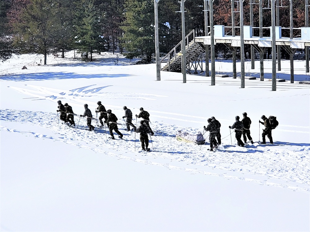 Fort McCoy Cold-Weather Operations Course Class 21-04 students conduct field training in snowshoes